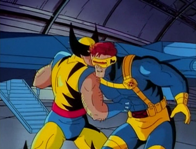Wolverine punches Cyclops