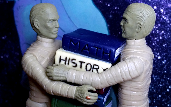 Mummy Brothers with stack of books