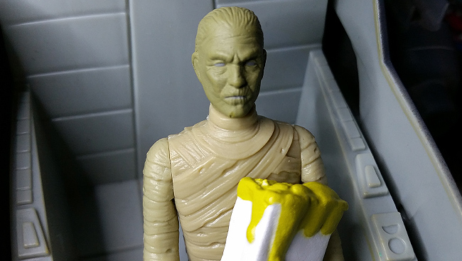 Mummy Brother holding barf bag