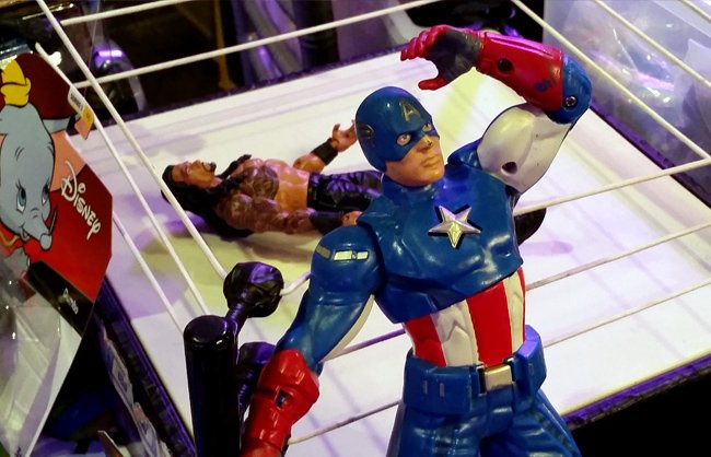 Captain America in front of wrestling ring