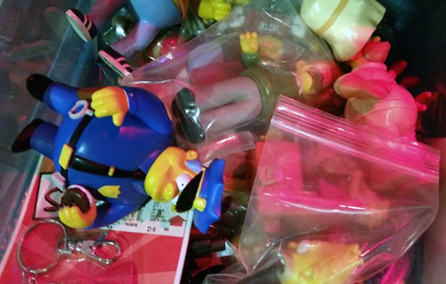 Playmates Simpsons figures in bin