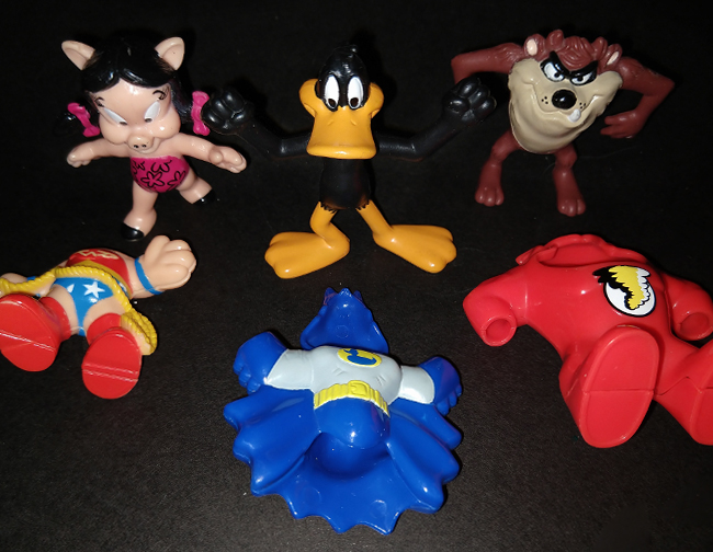 Looney Tunes figures out of costume