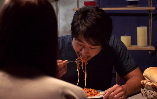 Kazuya eating spaghetti