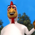 Humanoid chicken smiling and waving
