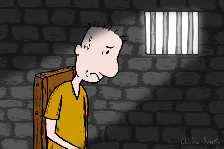 Doug funny in a darkened prison cell, sitting in a chair and sweating