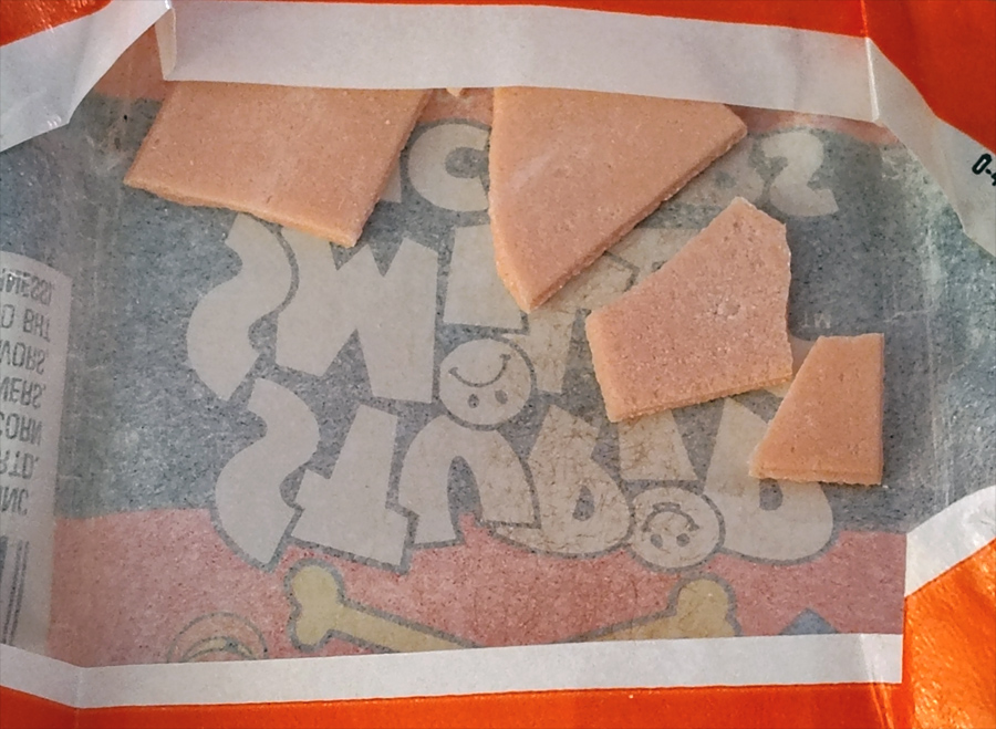 The broken remains of an old stick of gum inside the card pack wrapper