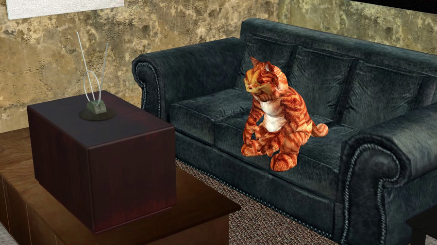 Orange Cat sitting on a sofa watching tv